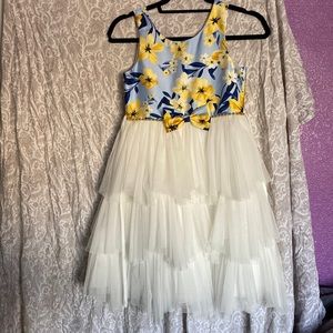 Yellow girls flower dress and Tull on bottom half perfect for spring
